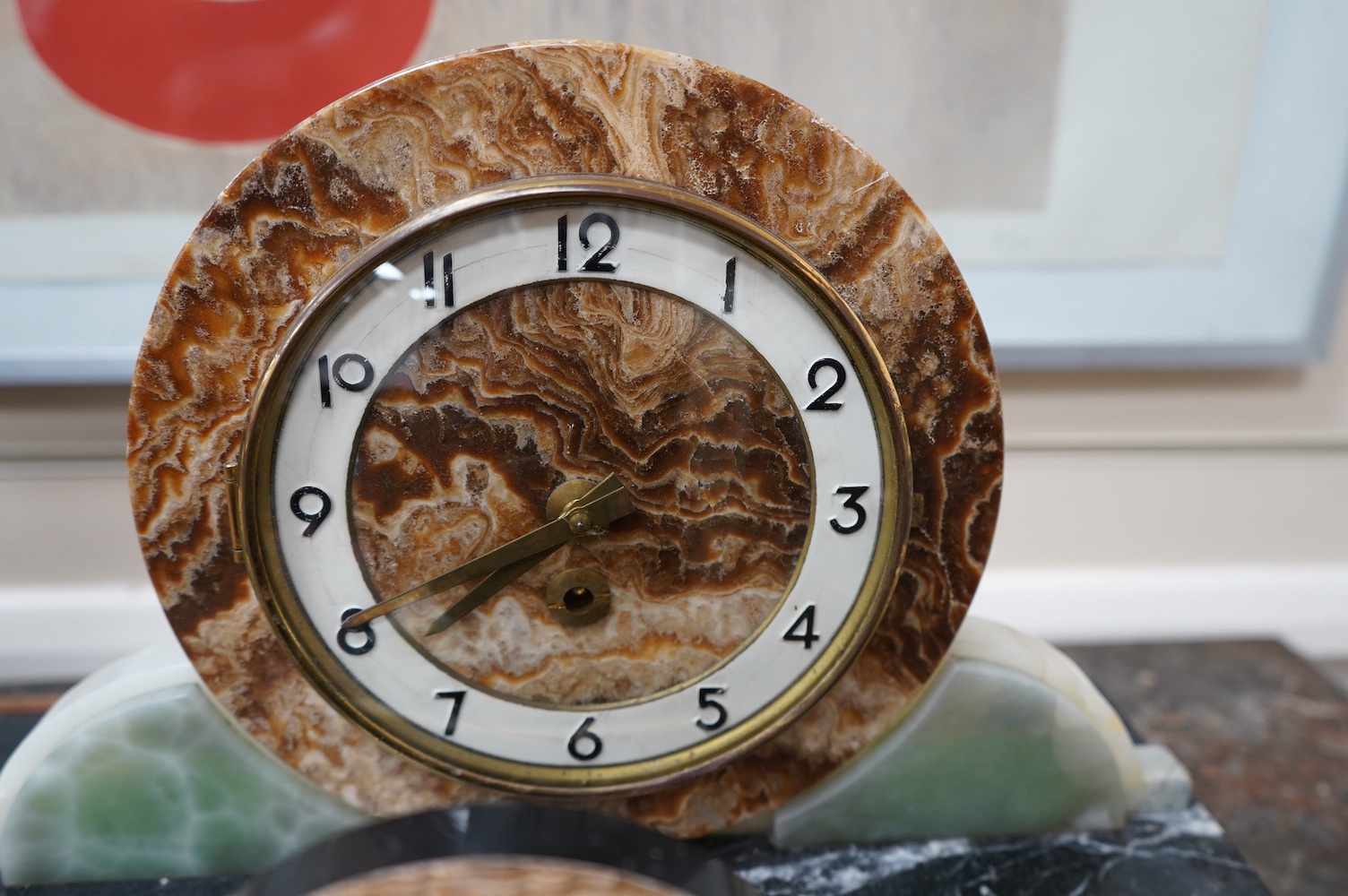 A French Art Deco marble clock garniture surmounted with a stylised spelter seagull, clock 72cm wide. Condition - fair, untested